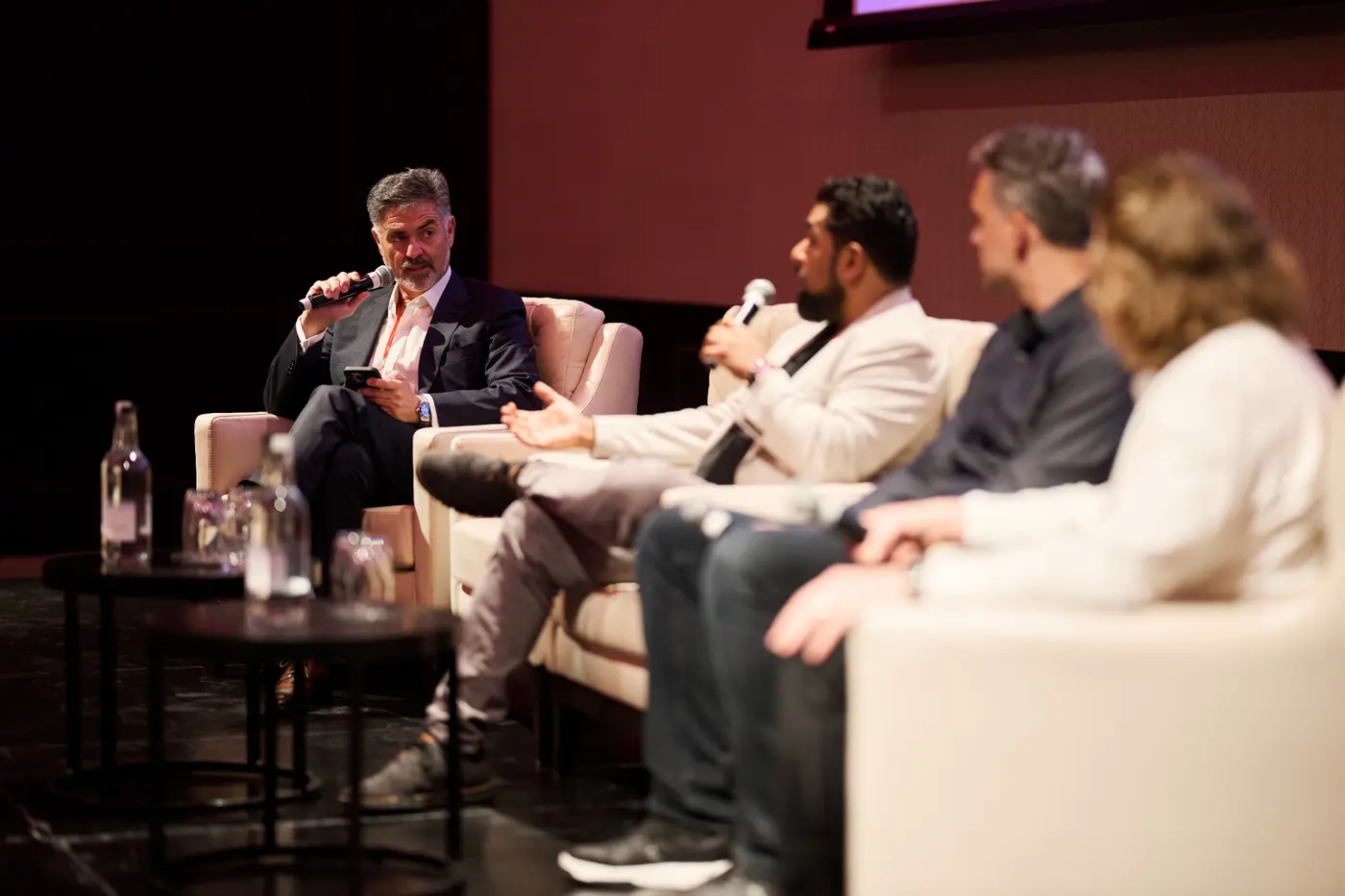 Cristian Ulloa speaking during a panel discussion